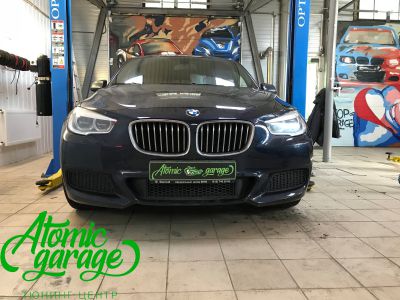 BMW 5 GT, ремонт запотевания фары - фото 6