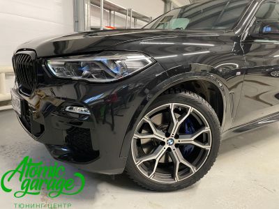 BMW X5 G05, покраска масок фар в черный мат и нанесение лазерной гравировки  - фото 1