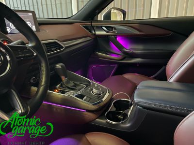 Mazda CX-9, контурная подсветка салона AmbientLight + подсветка ниш ног, карманов и ручек дверей - фото 7