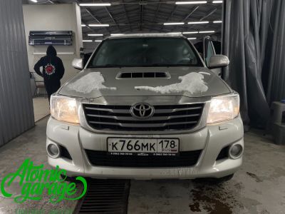 Toyota Hilux, установка светодиодных линз Aozoom A15 4300K + полировка и бронирование стекол фар  - фото 1