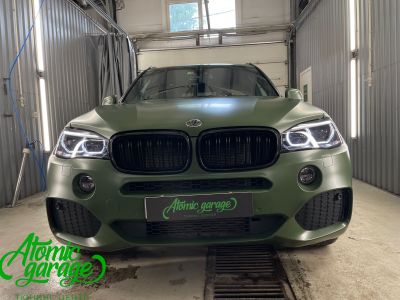 BMW X5 G05, оклейка кузова цветной виниловой пленкой Bruxsafol Matt Commando Green CC 4176 - фото 22