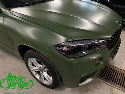 BMW X5 G05, оклейка кузова цветной виниловой пленкой Bruxsafol Matt Commando Green CC 4176 - фото 11