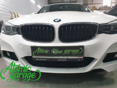 BMW 3 GT, установка защитной сетки радиатора в бампер - фото 8