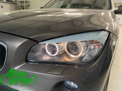 BMW X1 E84, линзы Hella 3r + новые лампы D1S Osram + замена Angel Eyes - фото 2